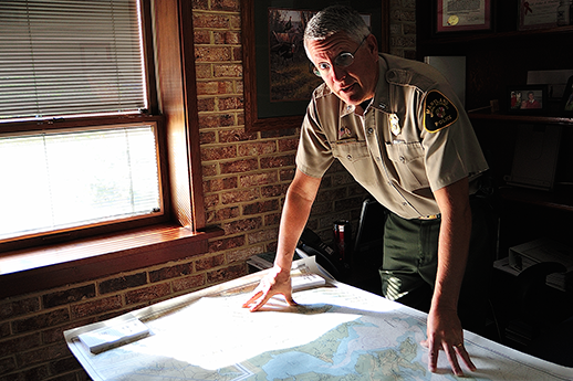 Lieutenant Art Windemuth standing looking at camera. Credit: Michael W. Fincham